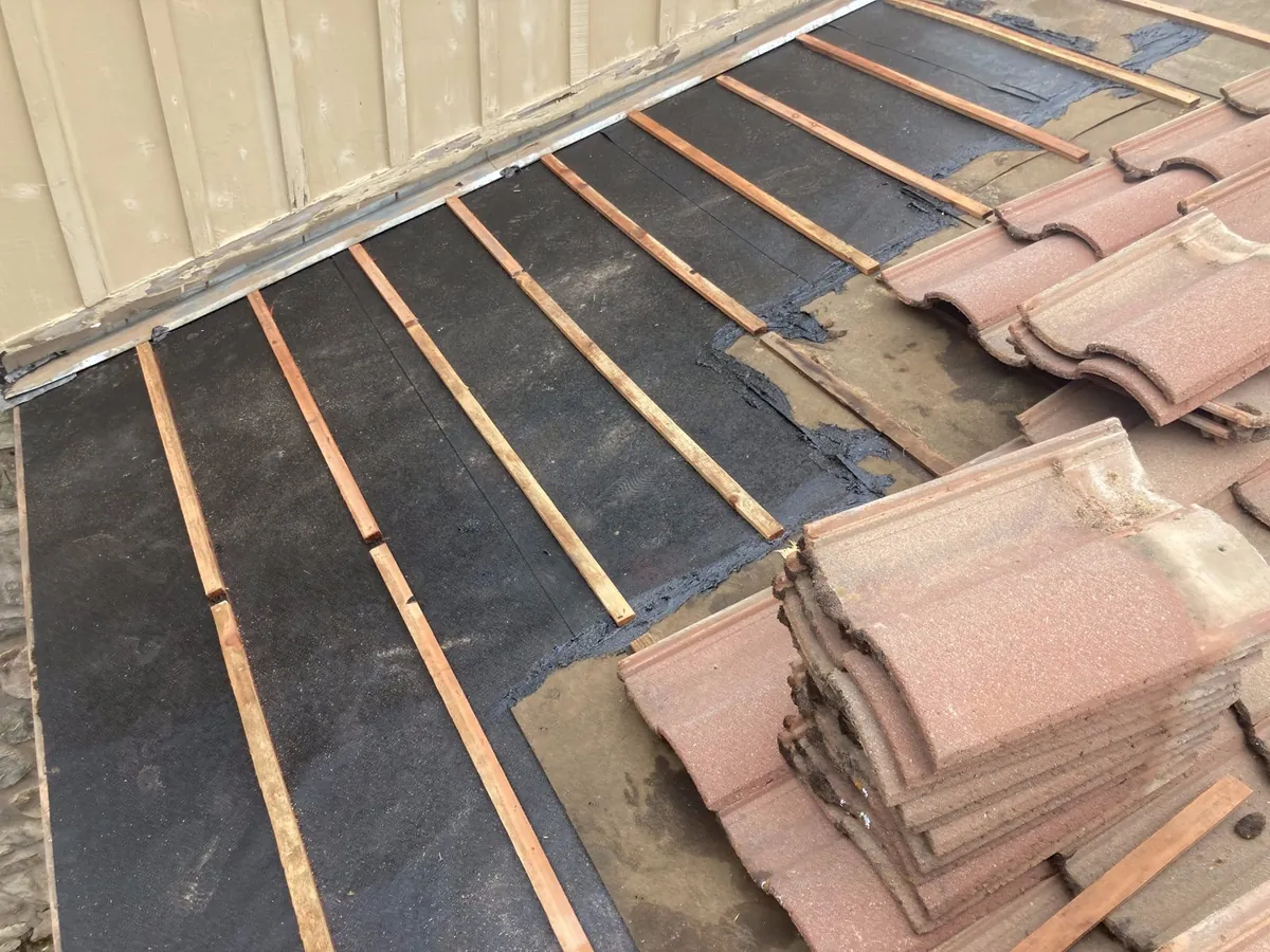 Tile roof repair with new underlayment and battens — Northern California